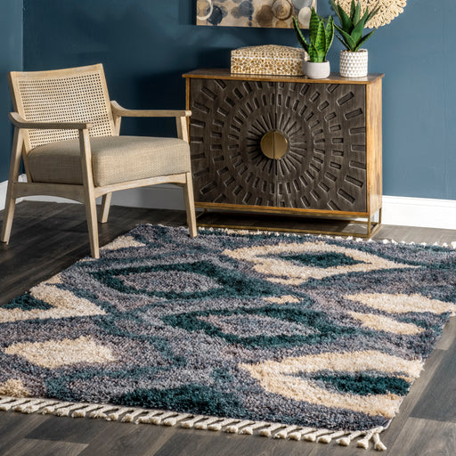 Zaniyah Abstract Iris Shag with Tassel Area Rug